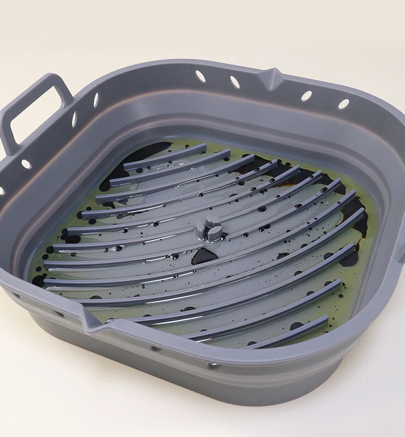 panier en silicone gris avec huile